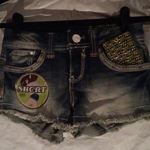 Nwt very short shorts with small rhinestone detail around the pockets and back.